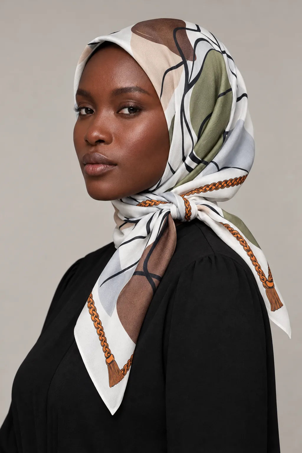 Silk Olive Abstract Murabba Scarf, 90×90 cm square hijab in Kuwait — closeup portrait