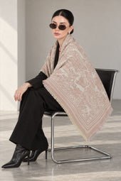 LIGHT PINK GULABI cashmere animal print square shawl folded into a triangle — seated
