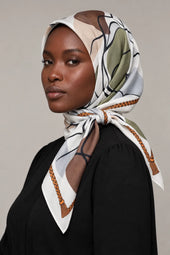 Silk Olive Abstract Murabba Scarf, 90×90 cm square hijab in Kuwait — closeup portrait