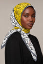 Silk Sunshine Lily Murabba Scarf, 90×90 cm square hijab in Kuwait — closeup portrait