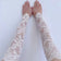 Lace gloves with floral design sleeves